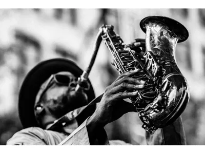 Few things personify cool like a shades-wearing instrumentalist masterfully commanding the saxophone.