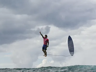 Brazilian Olympic surfer Gabriel Medina pops up after riding a barrel wave at&nbsp;Teahupo&#39;o during the Summer Games on Monday. The photo by&nbsp;J&eacute;r&ocirc;me Brouillet&nbsp;has gone viral.