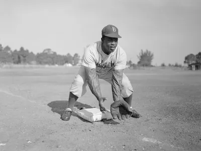 Jackie Robinson was the first Black athlete to play in modern Major League Baseball.