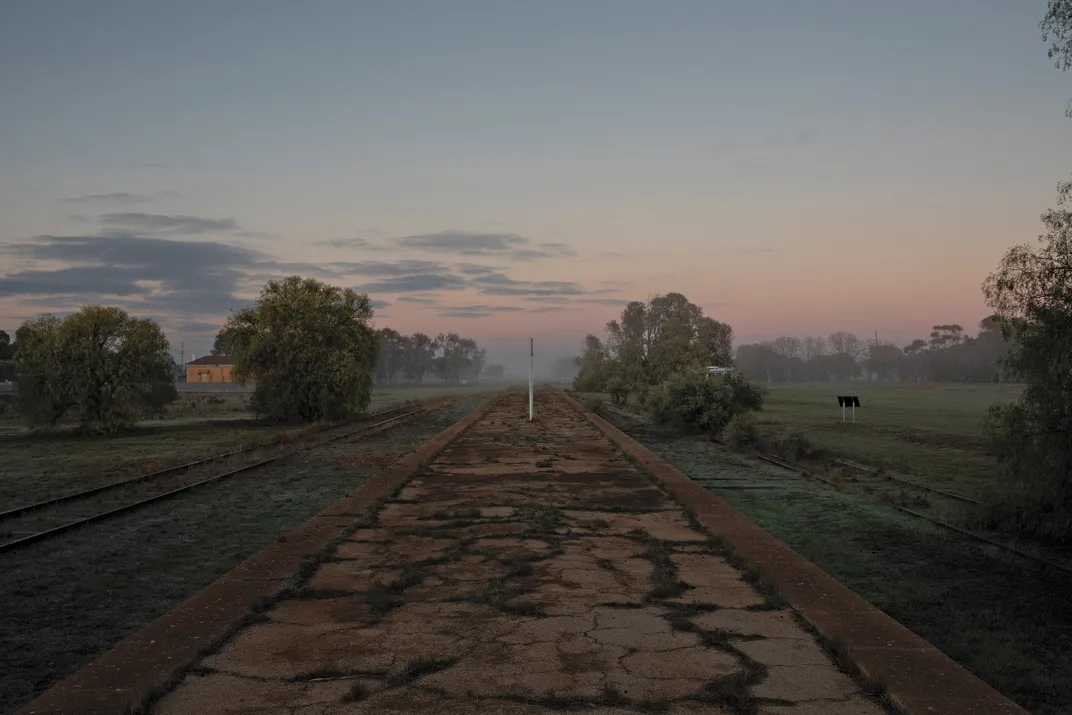 an abandoned railroad station platform