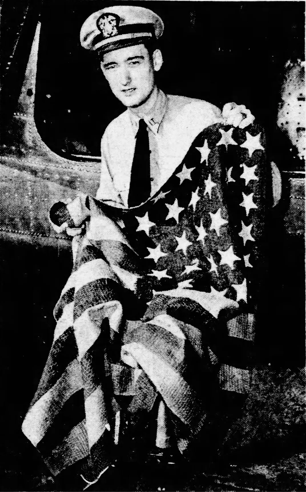 Lieutenant John K. Bremyer holding the Perry flag